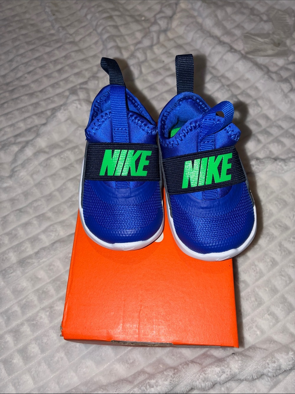 Nike Bright Blue Baby Slip-On Sneakers with Neon Green Logo